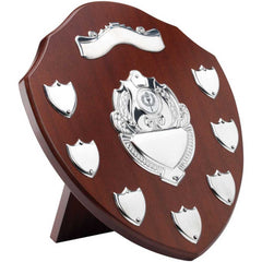 MAHOGANY SHIELD WITH CHROME FRONTS AND 7 RECORD SHIELDS (1in CENTRE) - 11in
