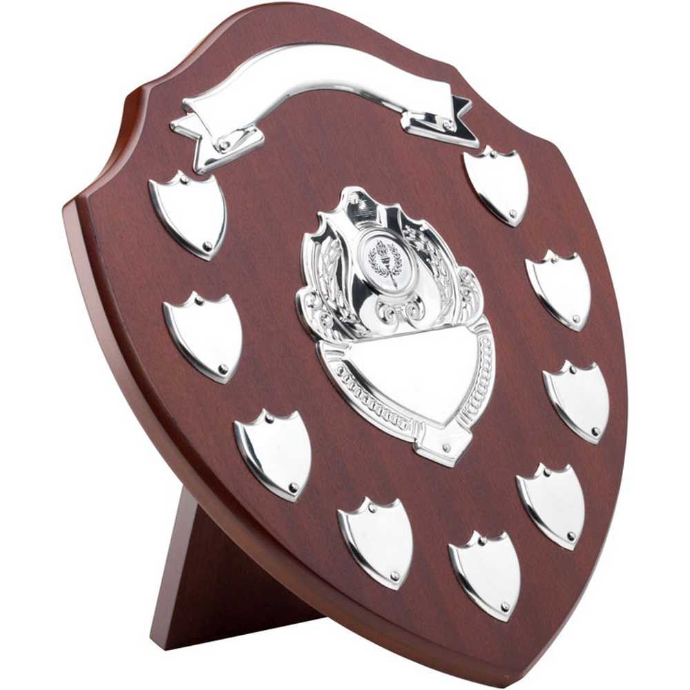 MAHOGANY SHIELD WITH CHROME FRONTS AND 9 RECORD SHIELDS (1in CENTRE) - 12.75in