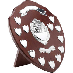 MAHOGANY SHIELD WITH CHROME FRONTS AND 13 RECORD SHIELDS (1in CENTRE) - 14in